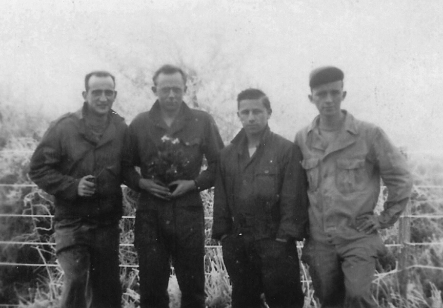 Frederick J. Lang Ground Crew with Flowers - 601st Squadron - 1944